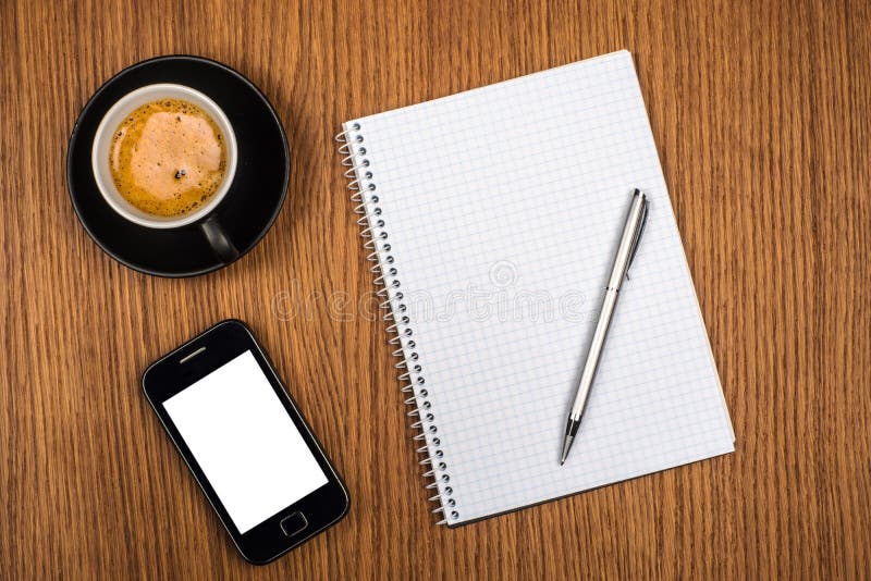 Coffee with blank notebook