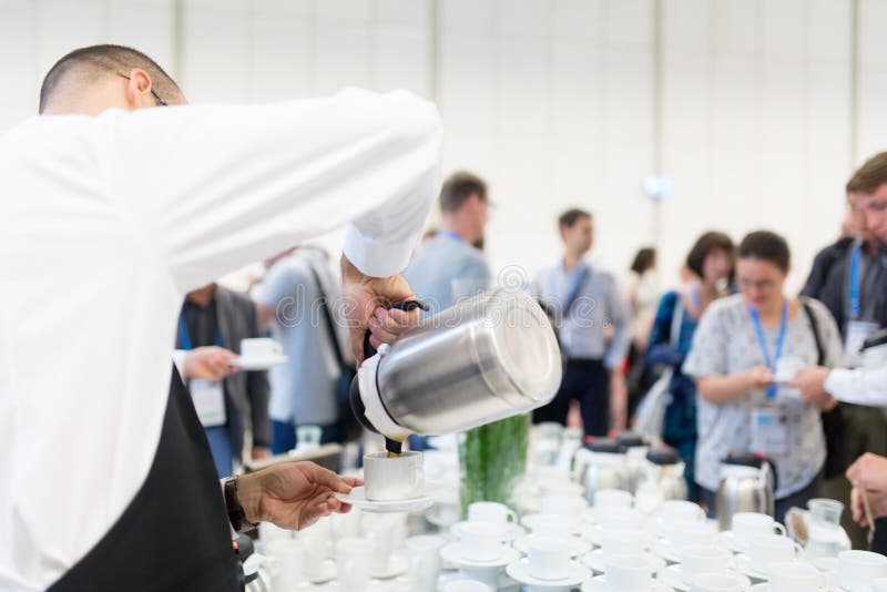 Coffee break at conference meeting. stock photo