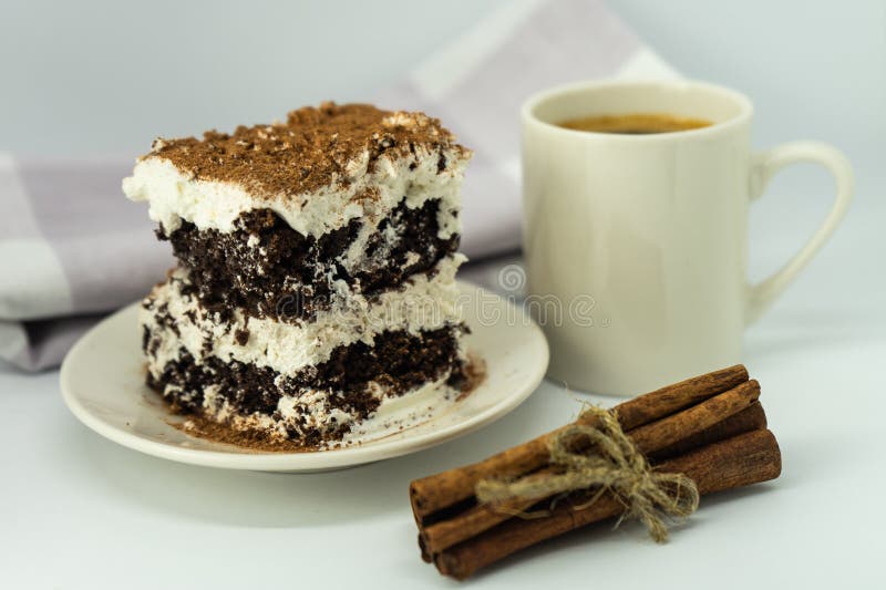 Coffee Cake and a Cup of Coffee on a Light Background. Selective Focus