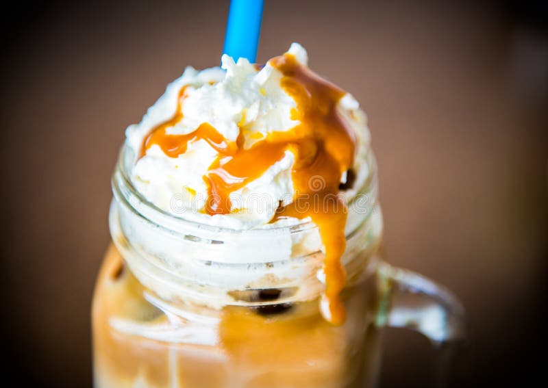 Coffee with caramel syrup stock photo. Image of cafe 57950356