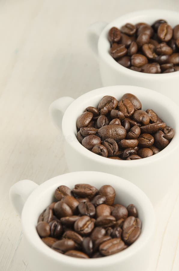 Coffee. Coffee Cups and Coffee Beans. Stock Photo Image of roasted, beans 81902740