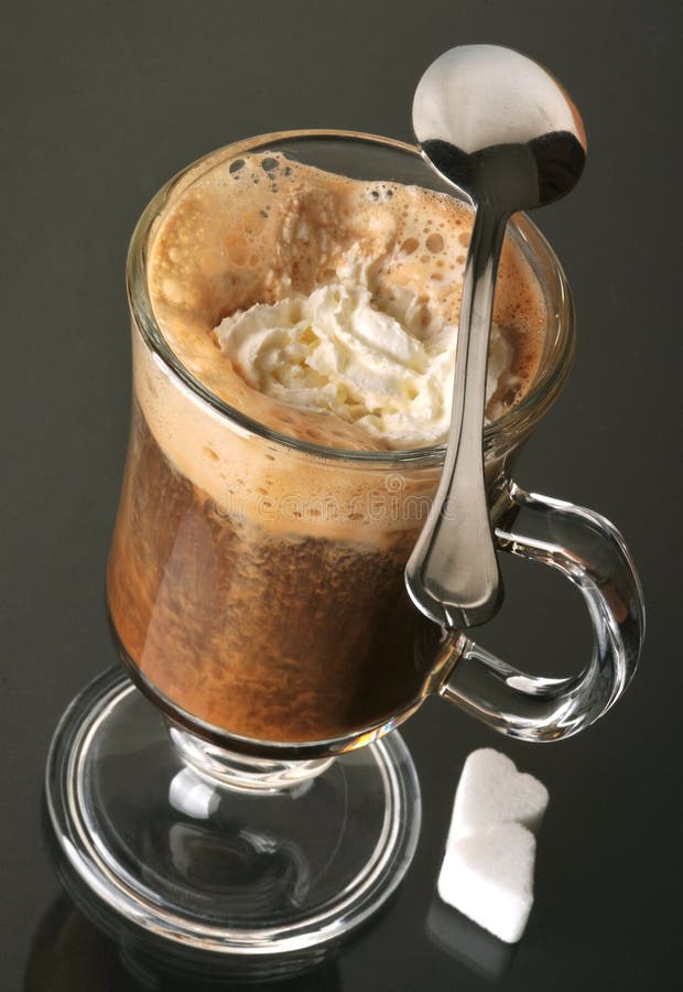 Affogato Coffee with Ice Cream on a Glass Cup Grey Slate Background