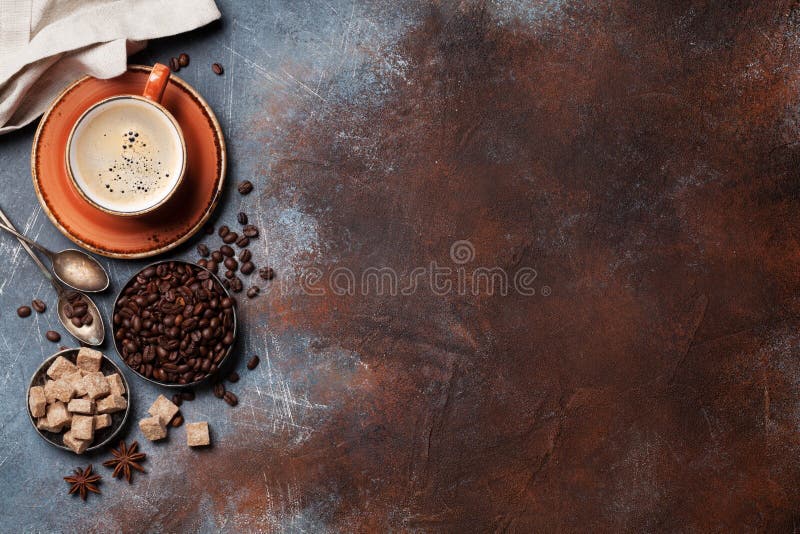 Coffee cup, beans and sugar