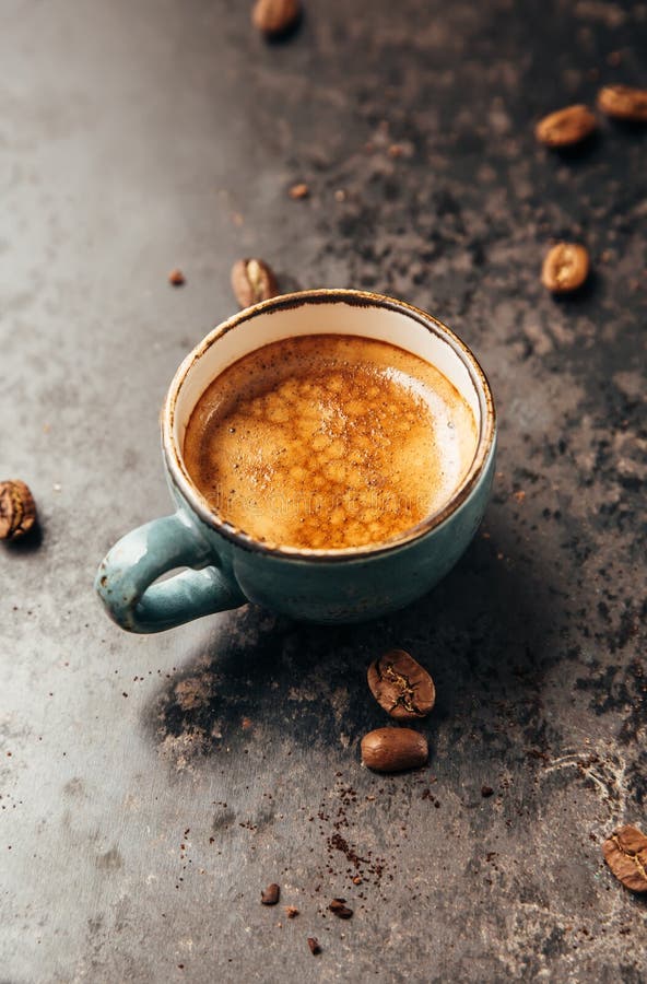 Coffee cup and beans