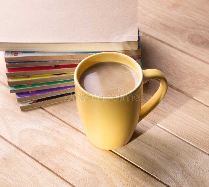 Coffee cup with the book.