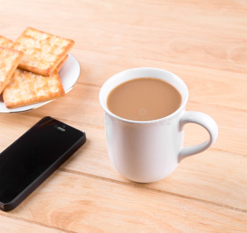 Coffee Cup with the Bread and Put on the Table. Stock Image Image of