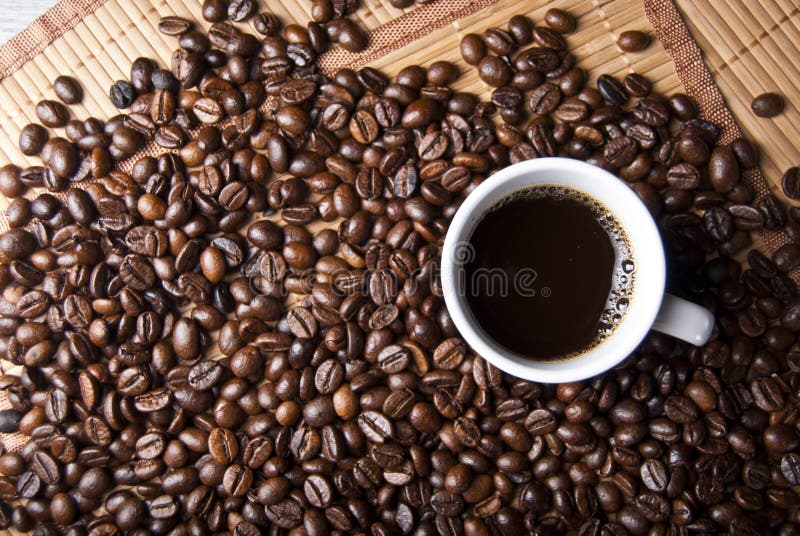 Coffee cup and coffee beans