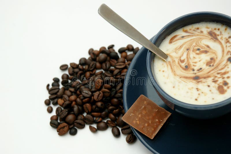 Coffee cup and coffee beans