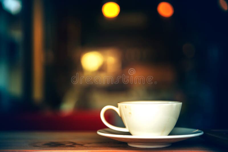 Coffee cup in coffee shop stock photo. Image of vintage 76977240