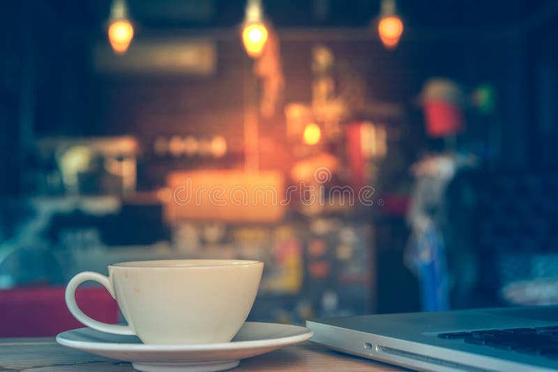 Coffee cup in coffee shop stock photo. Image of vintage 76977262