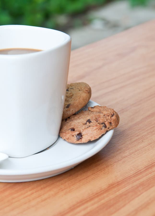 Coffee cup with cookie . stock image. Image of aromatic 24478055