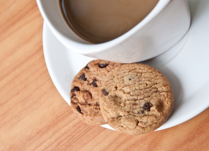 Coffee cup with cookie . stock image. Image of vintage 24479127