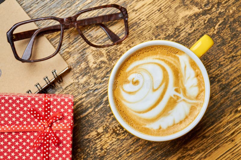 Coffee Cup, Glasses and Gift. Stock Photo Image of celebration, cafe