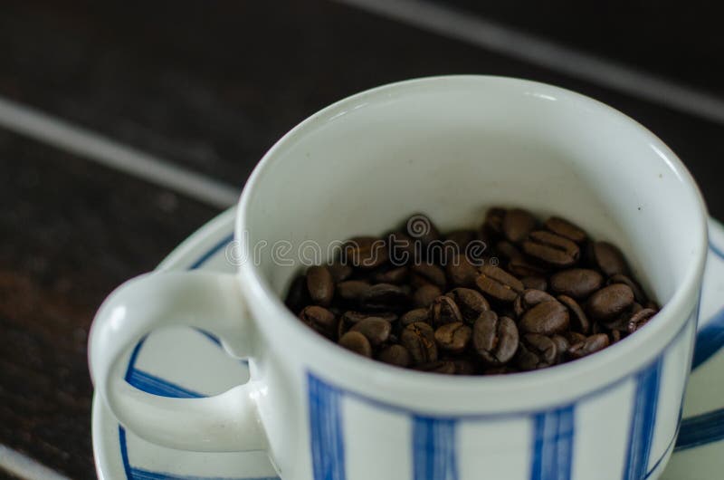 Coffee Cup with Good Quality Coffee Beans Inside 4 Stock Image Image