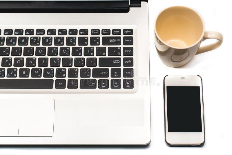 Coffee Cup With Laptop And Cell Phone Isolated On White Stock Image