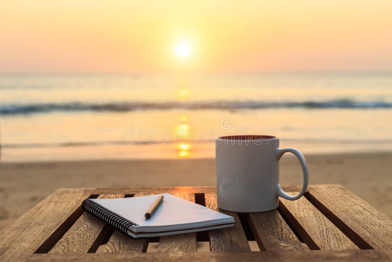 Coffee Cup On Wood Table At Sunset Or Sunrise Beach Stock Image ...