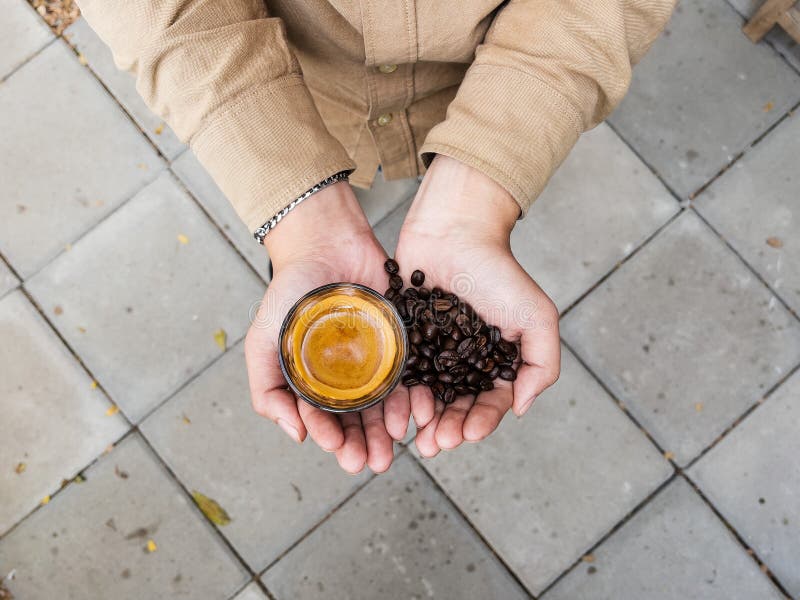 Coffee Beans and Coffee Espresso in Hand Stock Photo Image of beans