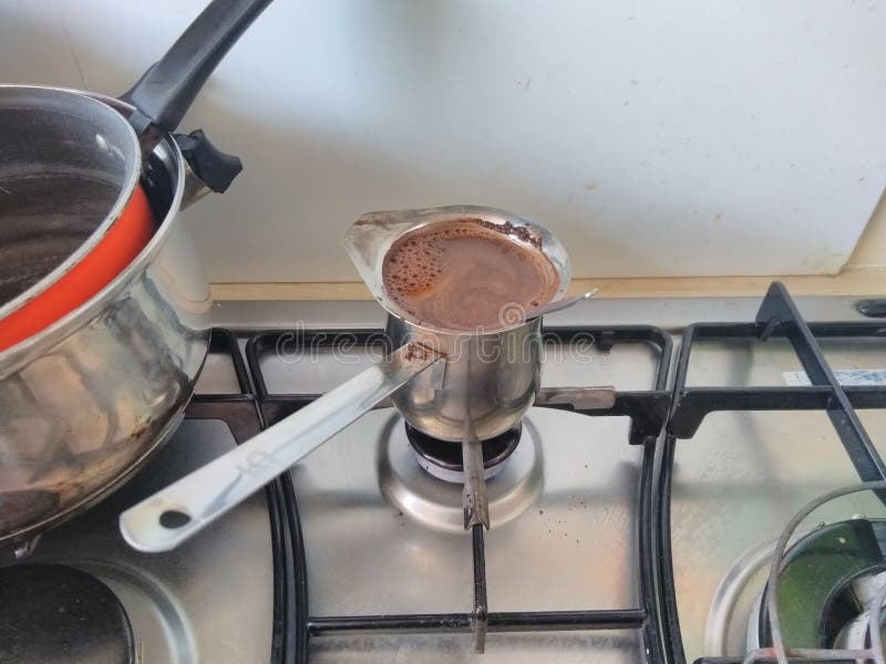 A Cup Of Coffee With Egyptian Patterns And Sweet Marshmallows On A Light Wooden Background Stock