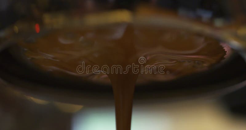 Coffee extraction with bottomless portafilter from pro machine stock video