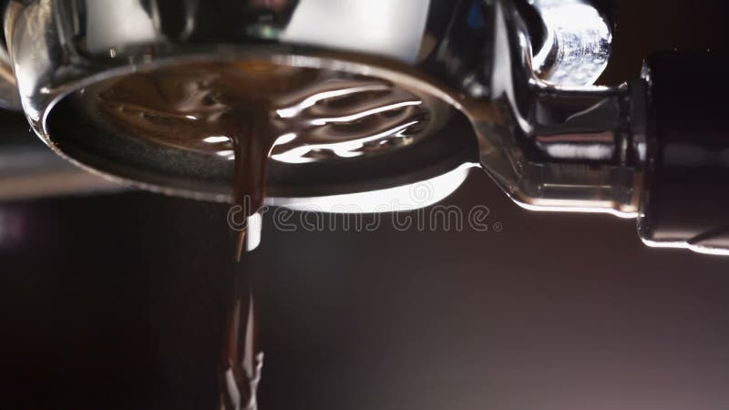 Coffee extraction with bottomless portafilter stock video