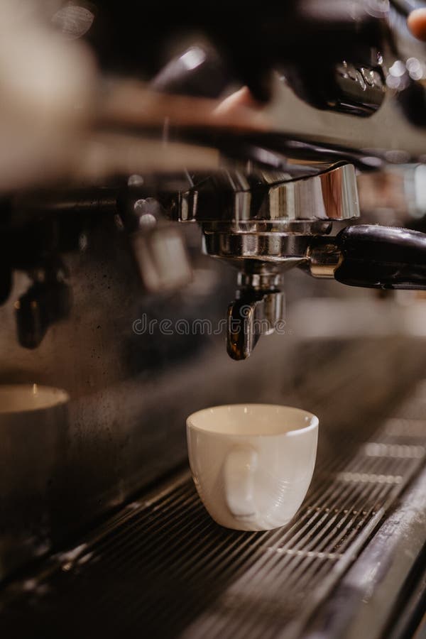 Coffee Extraction from Professional Coffee Machine. Coffee Shop Stock