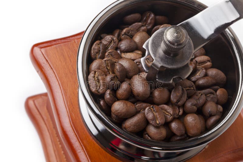 Coffee grinder with coffee beans and an inscriptio