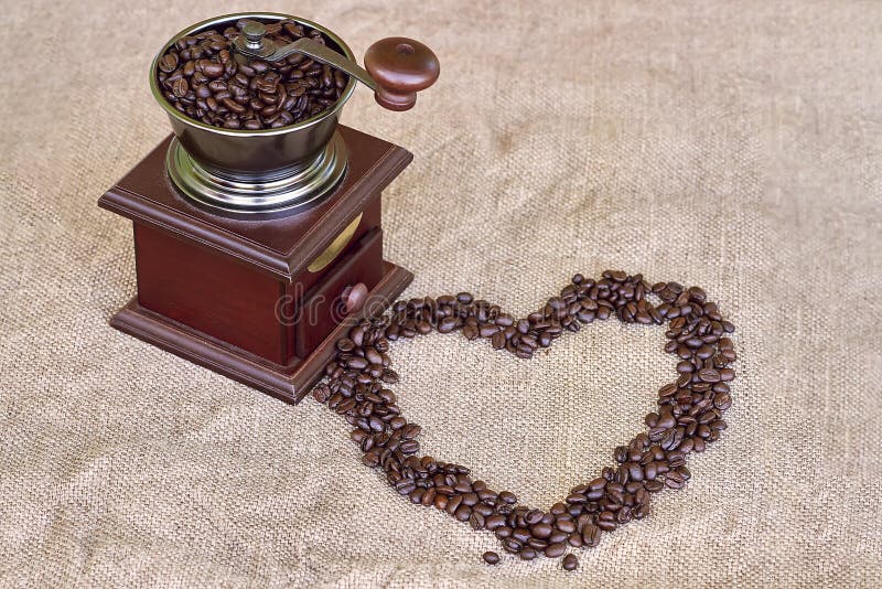 Coffee Grinder Full of Roasted Coffee Beans and Coffee Beans Heart