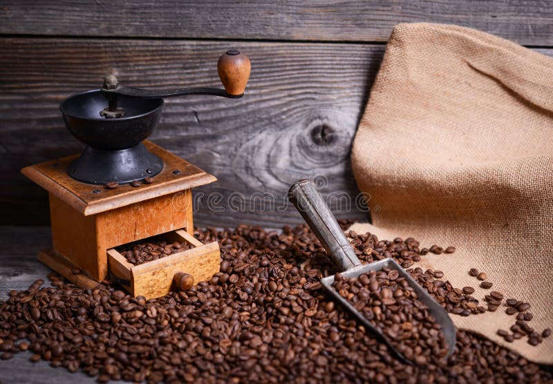 Coffee Grinder Sack And Vintage Scoop With Coffee Beans Stock Photo