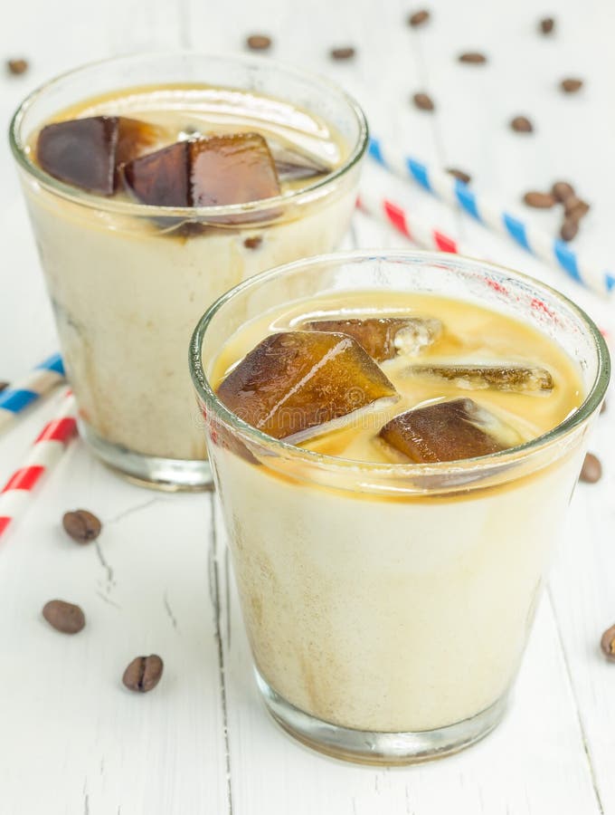 Coffee ice cubes with milk stock image. Image of awake 57537571