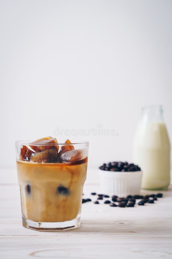 Coffee ice cubes with milk stock image. Image of beverage 132810311