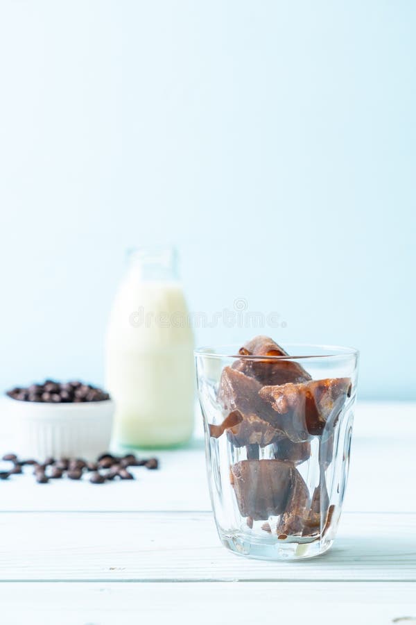 Coffee ice cubes with milk stock image. Image of fresh 134679683