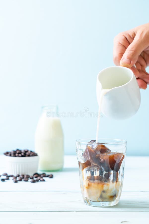 Coffee ice cubes with milk stock photo. Image of cube 150710364