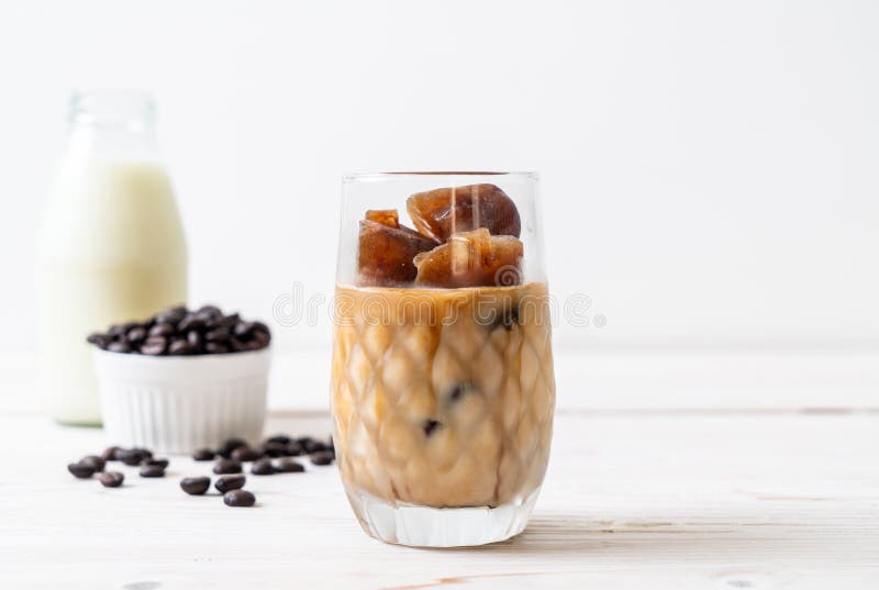 Coffee ice cubes with milk stock photo. Image of black 152467180