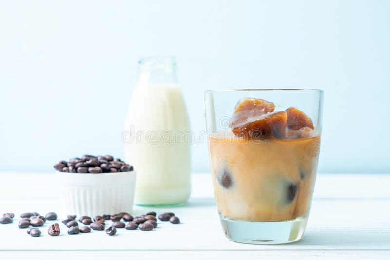 Coffee ice cubes with milk stock image. Image of iced 153428333