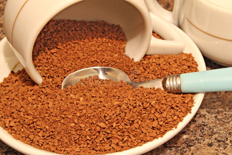 Instant, Freezedried or Granulated Coffee in a Transparent Cup on the