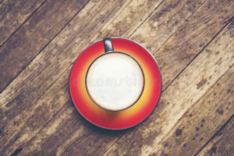 Red Coffee Cup With Heart Shape Latte Art On Wood Table At Cafe Stock