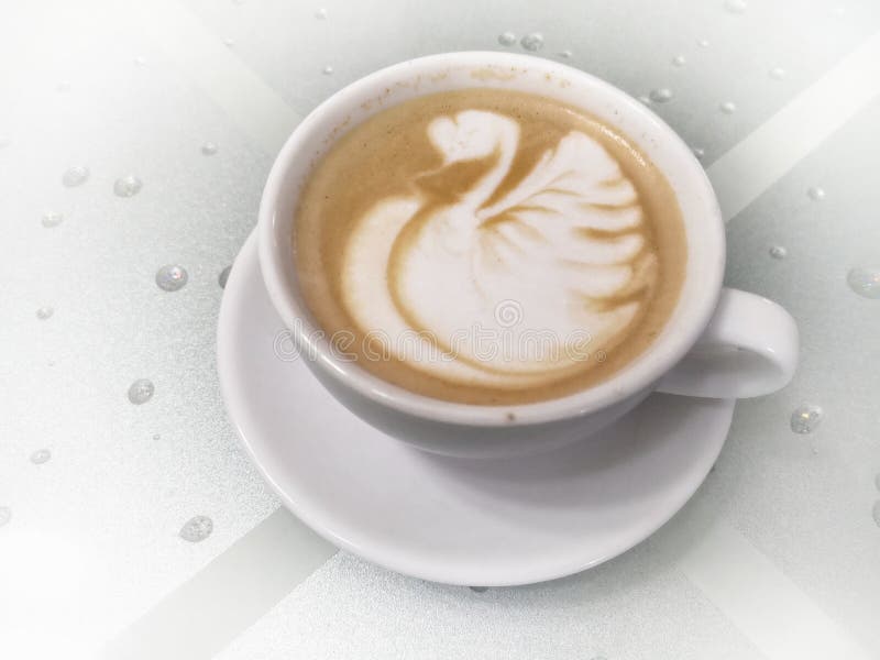 Coffee Latte art with swan stock image. Image of dish 231935081