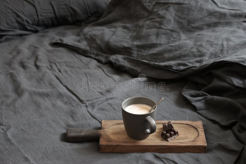 Coffee Latte And Chocolate In Unmade Bed Stock Photo - Image of loft ...