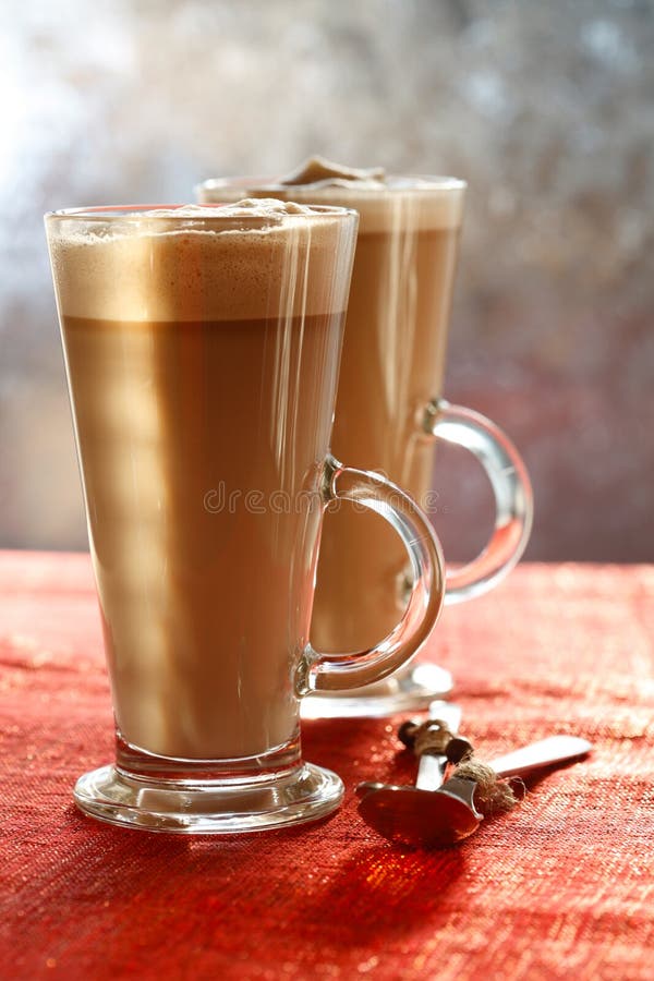 Coffee Latte on glitter backdrop with sunny light
