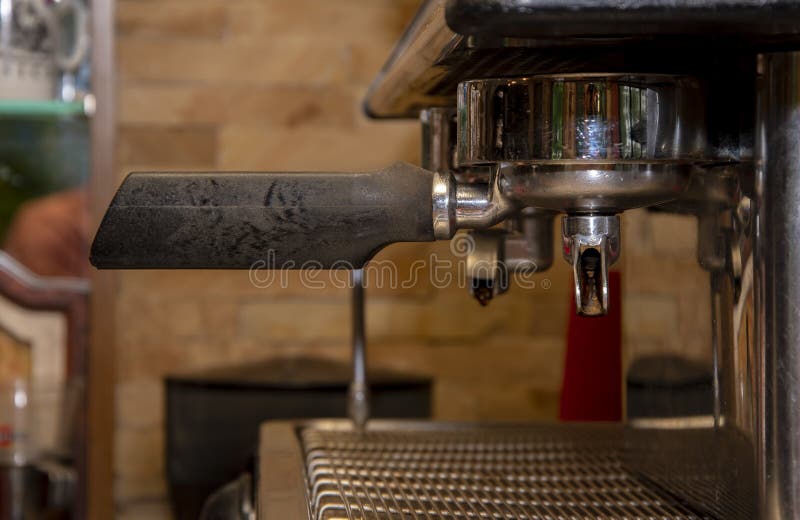 The Coffee Machine is on the Bar Counter, the Barista`s Workplace