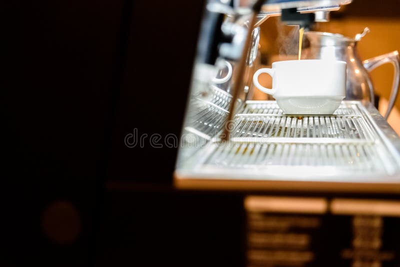 Coffee Machine Preparing an Espresso for Customers` Breakfast in a