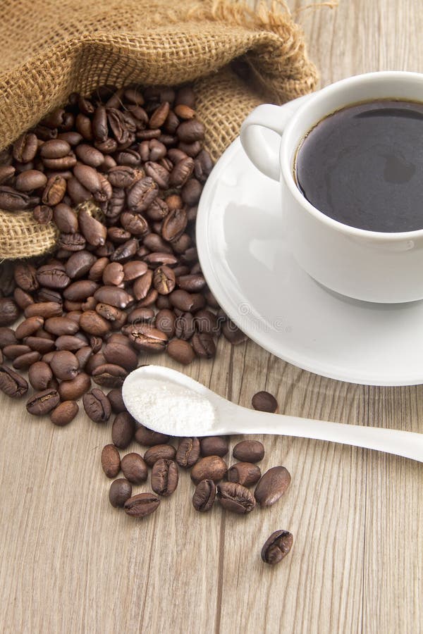 Coffee Bean and a Spoon Milk Powder Stock Photo Image of delicious, brown 44946890