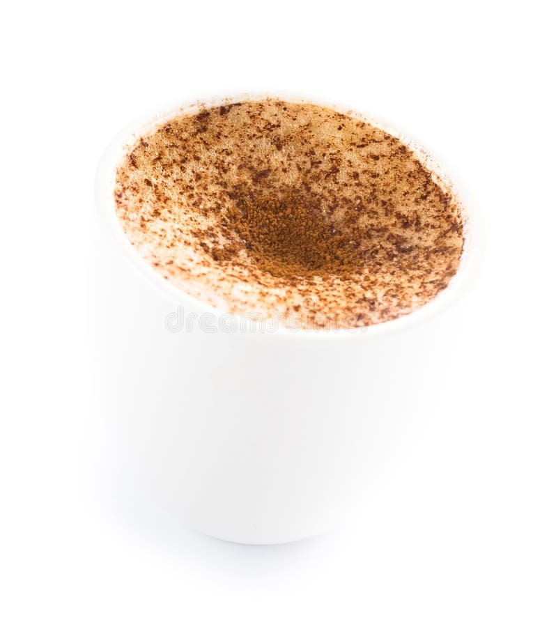 Coffee with Milk Powdered with Chocolate in a Cup on a White Background