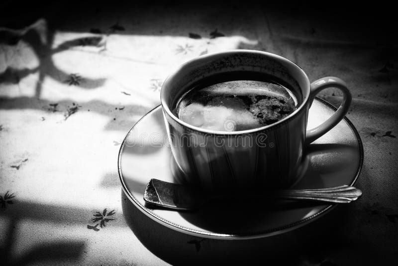 Coffee in the Morning with a Black and White Theme Stock Photo Image