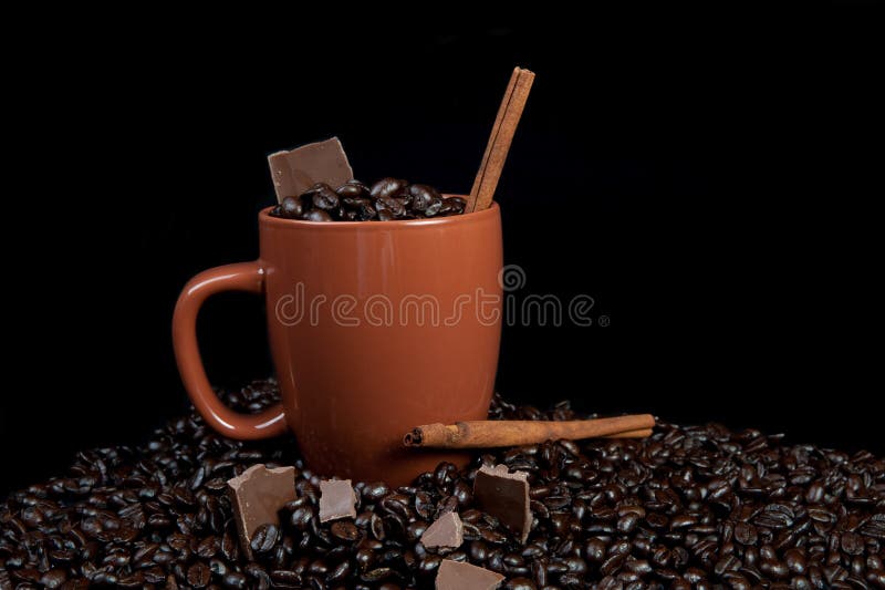 Coffee mug with beans stock image. Image of flavored 12227241