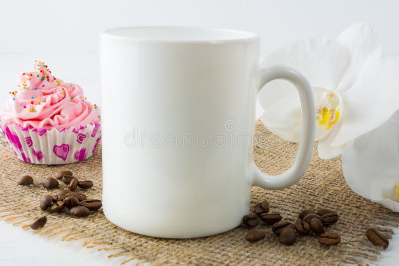 Coffee mug mockup with muffin