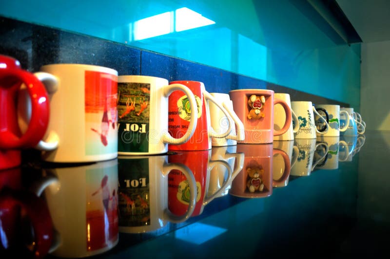 Coffee mugs collection on the floor