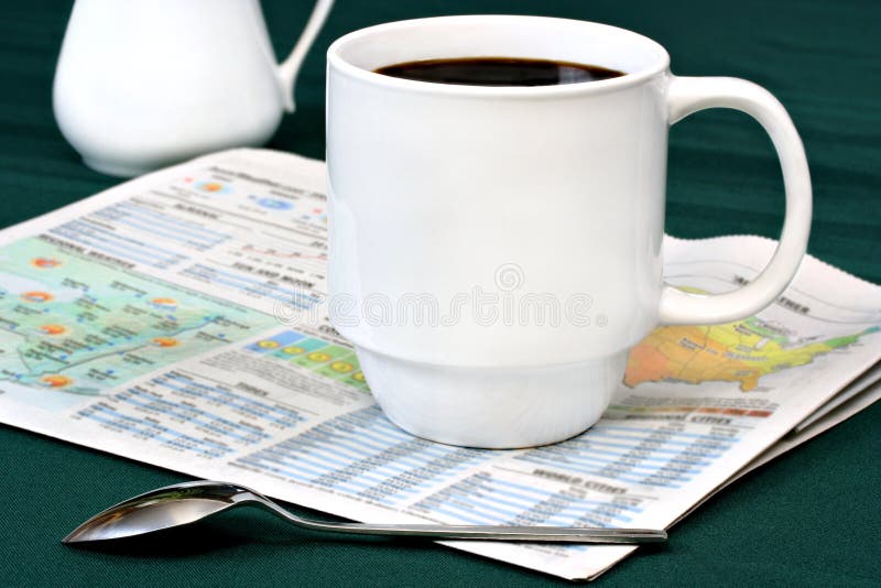 Coffee on Newspaper Weather Section stock image Coffee on Newspaper Weather Section stock image
