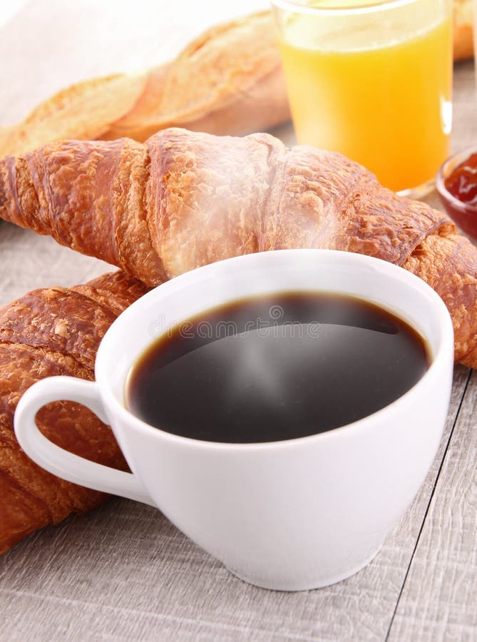 Coffee, orange juice and croissant royalty free stock image Coffee, orange juice and croissant royalty free stock image