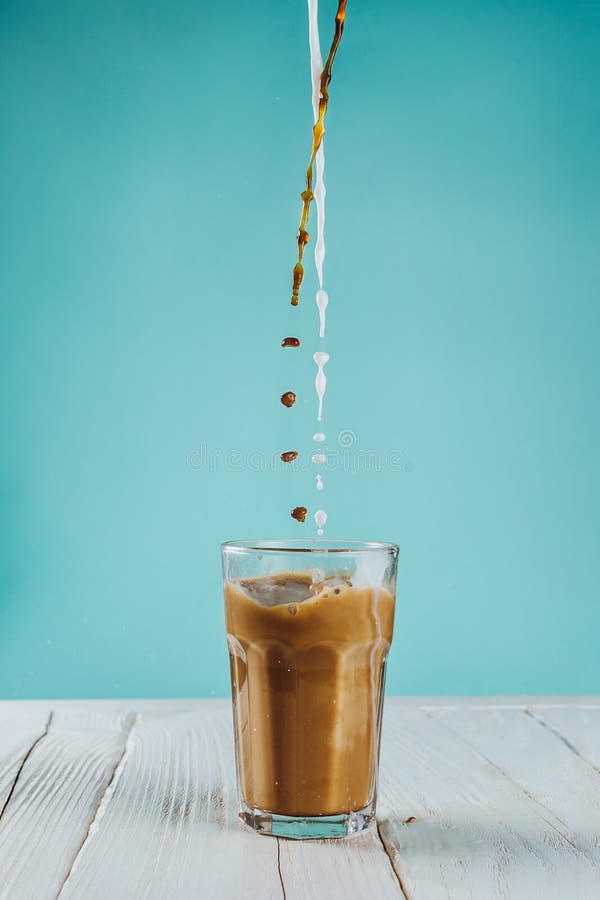 Coffee and Plant Based Milk Pouring in a Glass Stock Image Image of